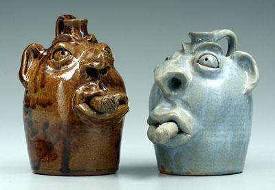 Two Robert Brown face jugs, with