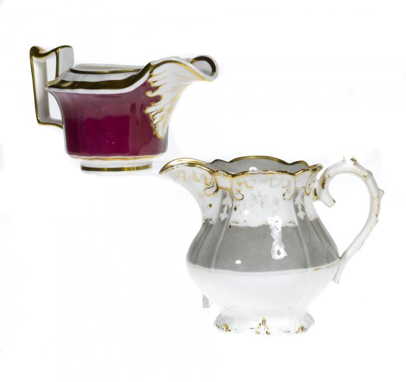 TWO ROCKINGHAM JUGS one with rustic