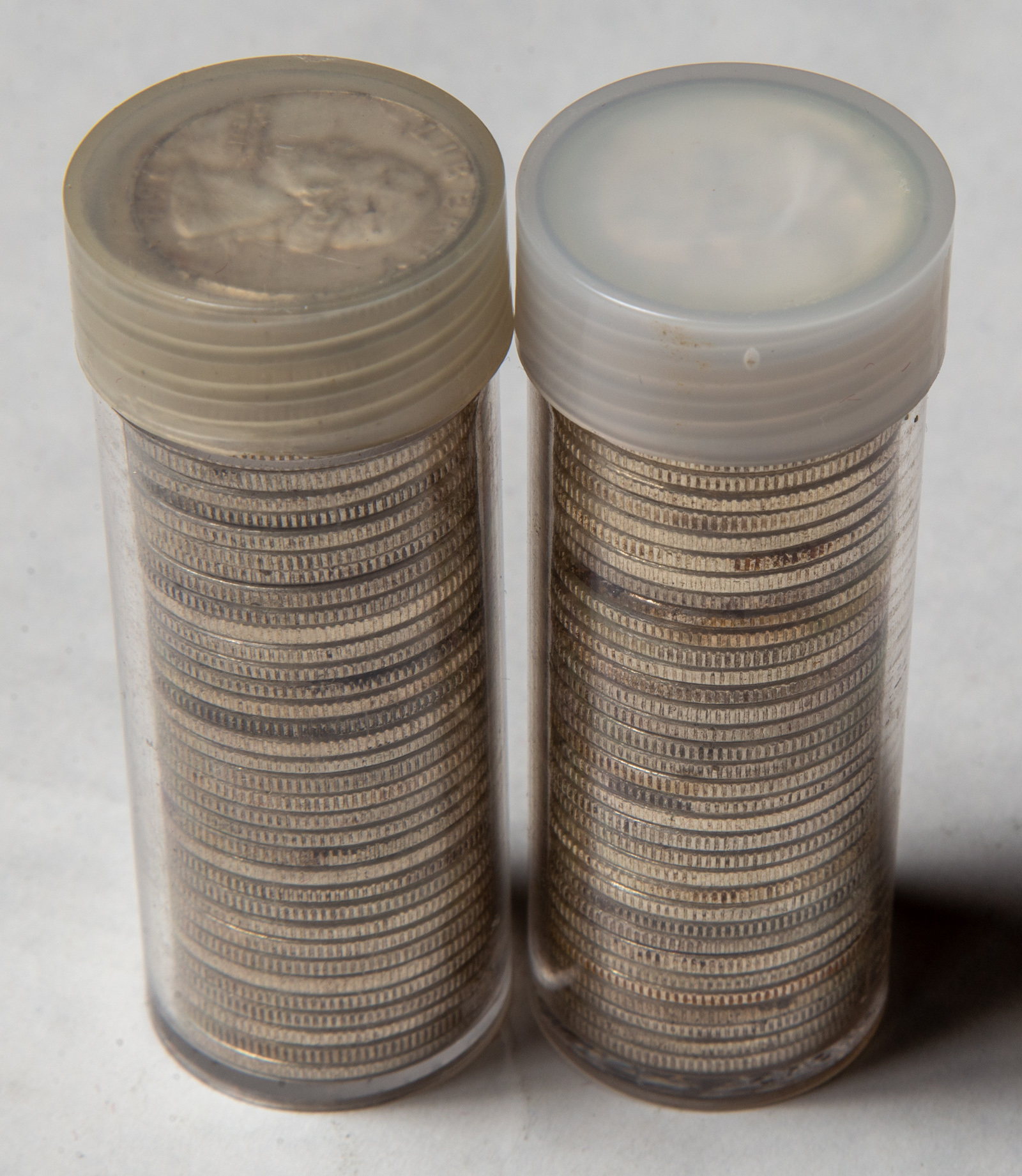 TWO ROLLS OF SILVER QUARTERS 1964