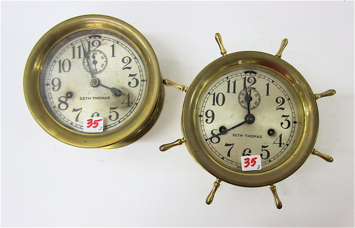 TWO ROUND BRASS SHIP'S CLOCKS
