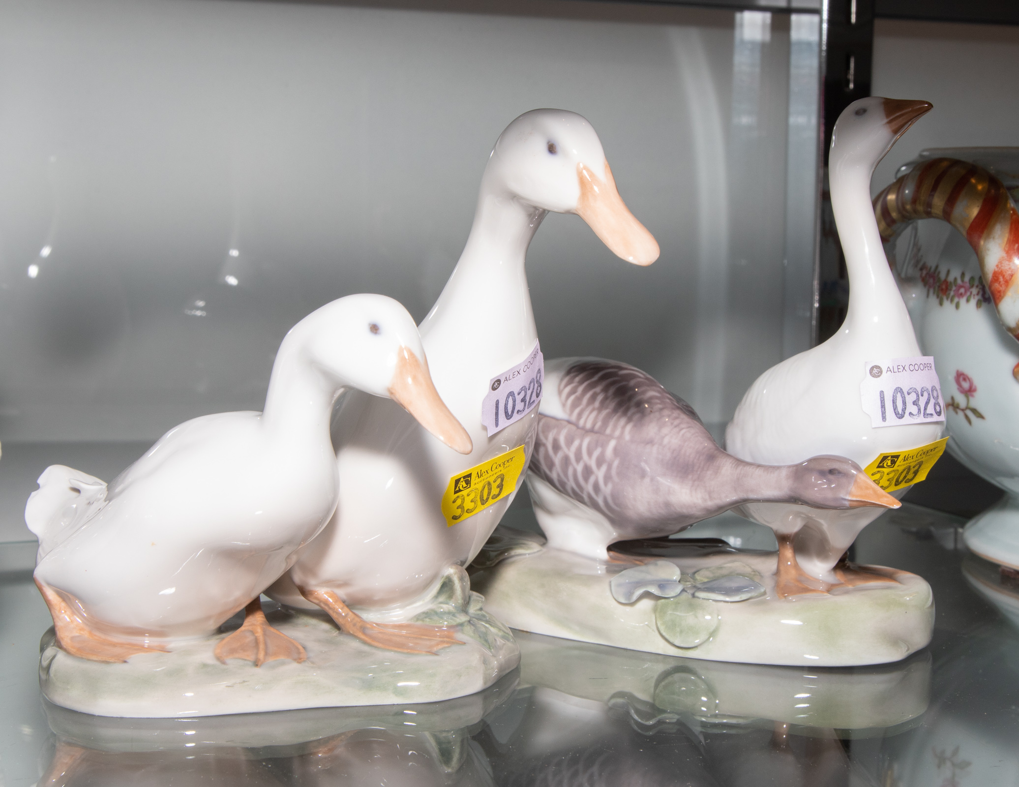 TWO ROYAL COPENHAGEN GOOSE GROUPS