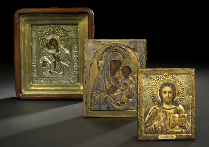 Two Russian Polychromed Ikons, 