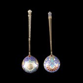 TWO RUSSIAN SILVER GILT CHAMPL