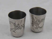 Two Russian silver vodka tots