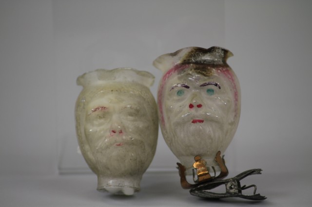 TWO SANTA HEAD CANDLE HOLDER