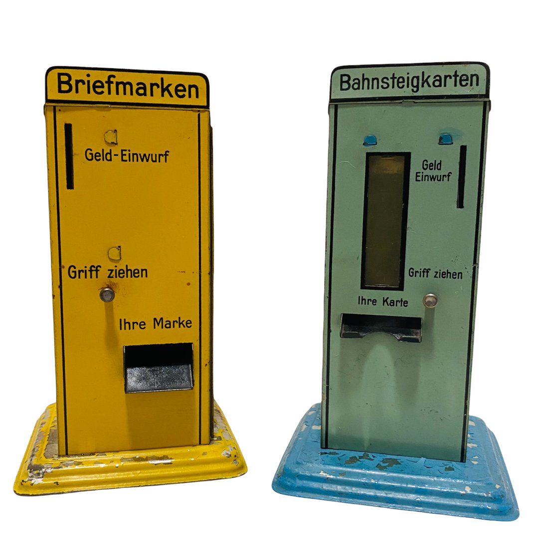 TWO SCARCE MECHANICAL VENDING TOY