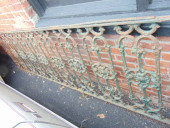 TWO SECTIONS OF CAST IRON FENC