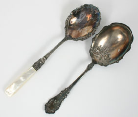 Two serving spoons: one 1847 Rogers