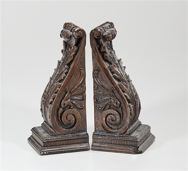 Two sets of bookends; one composite