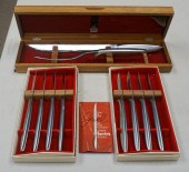 TWO SETS OF GERBER KNIVES AND