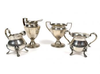 Two sets of sterling sugar &