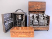 TWO SETS OF TANTALUS AND ONE E