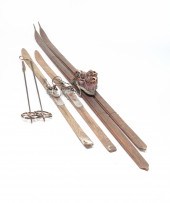 TWO SETS OF WOODEN SKIS. First