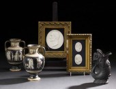 Two Shadowboxed Plaster Silhou