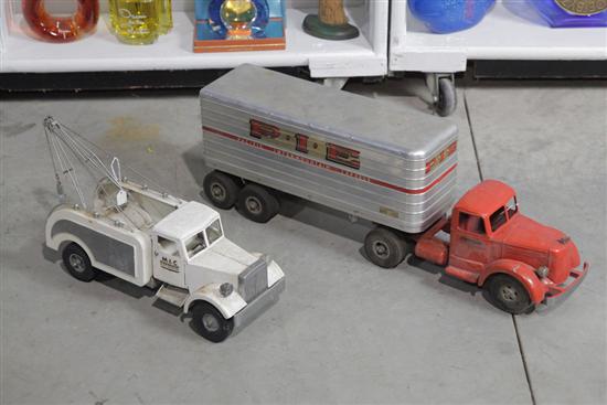 TWO SHEET METAL TOYS. White tow