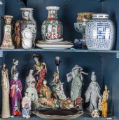 TWO SHELVES OF ASIAN CERAMICS