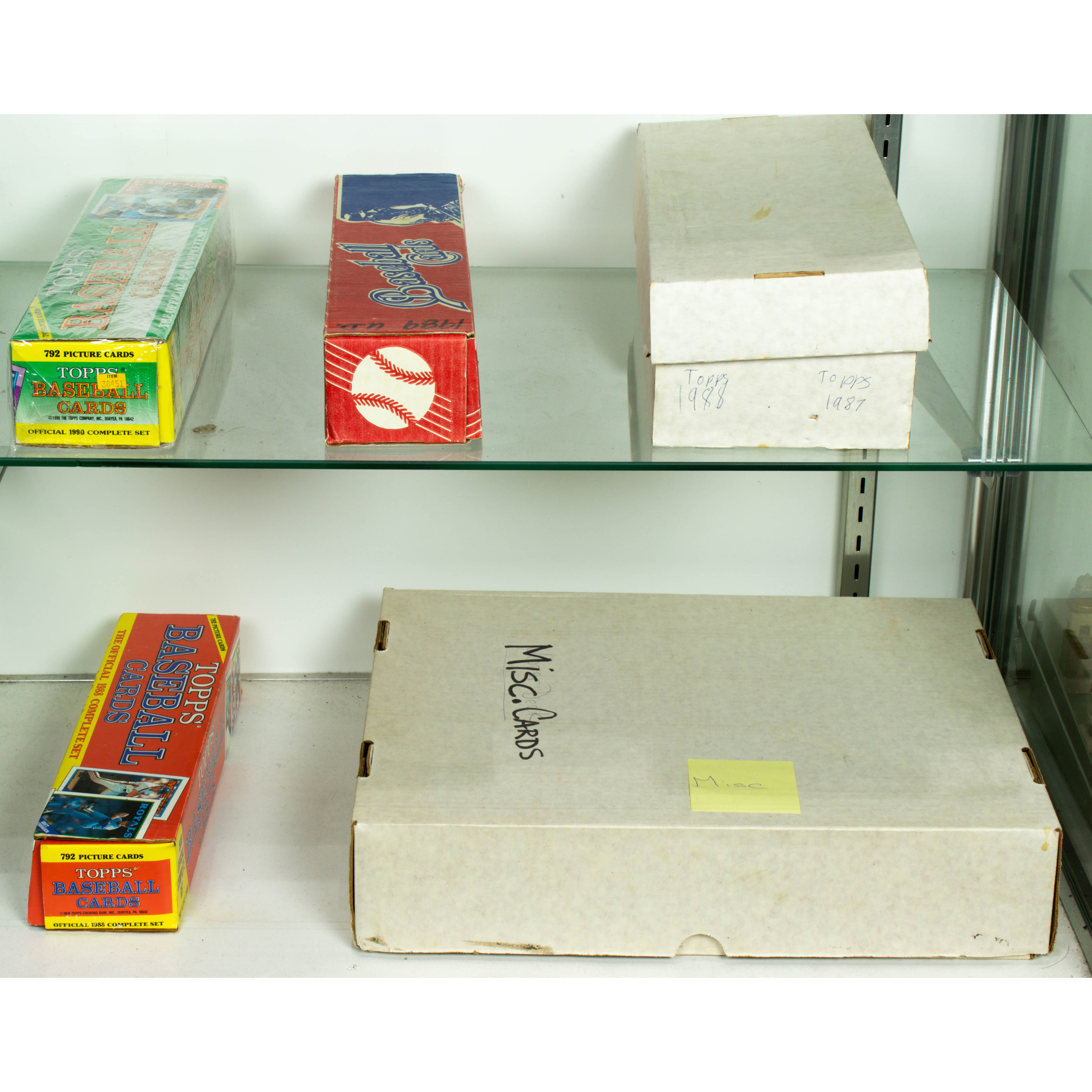 TWO SHELVES OF BASEBALL CARDS Two