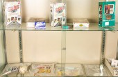 TWO SHELVES OF BASEBALL CARDS