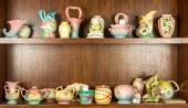 TWO SHELVES OF HULL POTTERY Tw