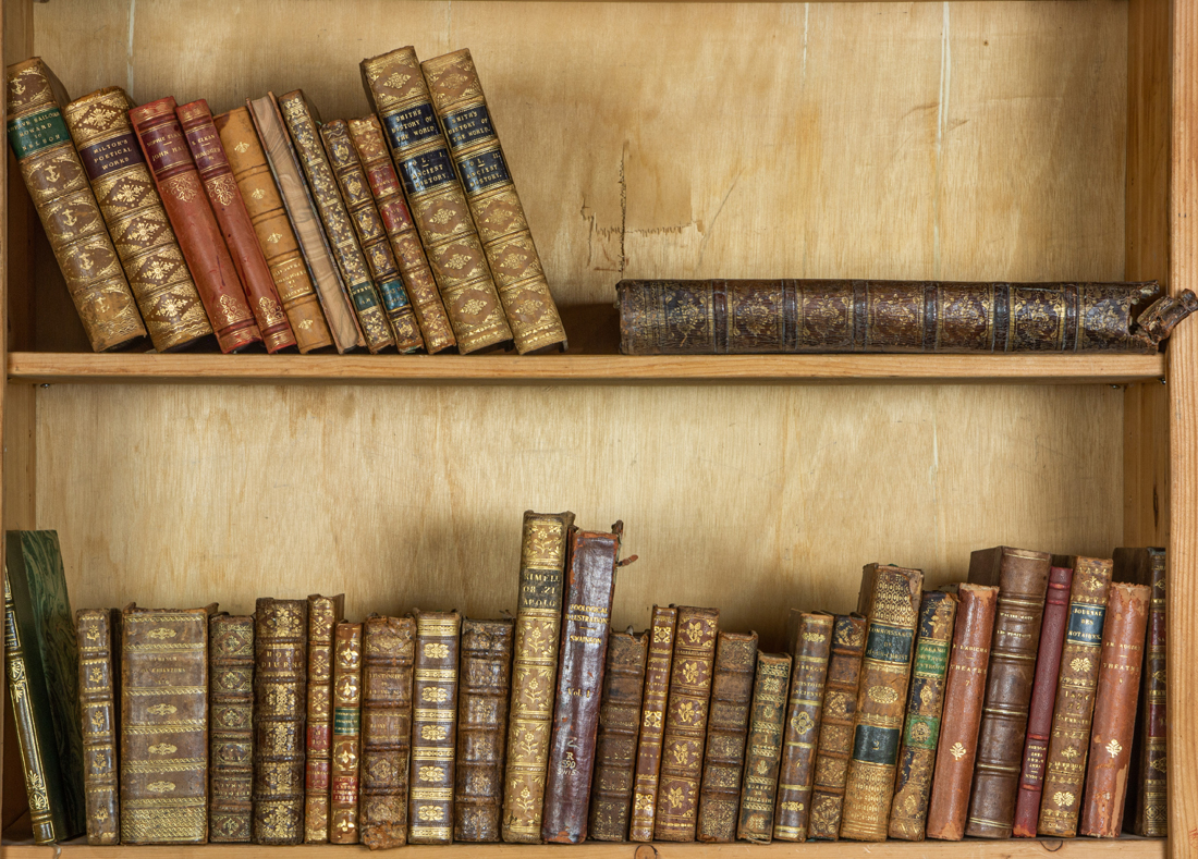 TWO SHELVES OF LEATHER BOUND