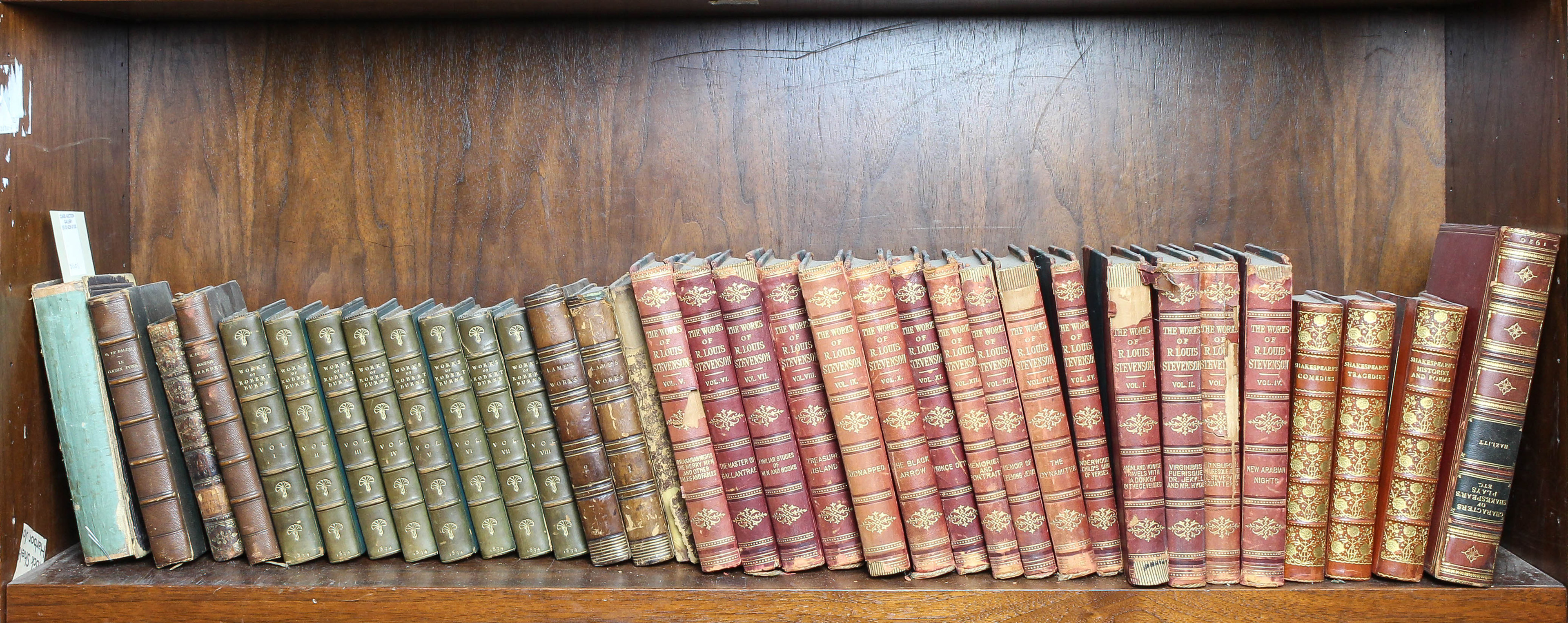 TWO SHELVES OF LEATHER BOUND
