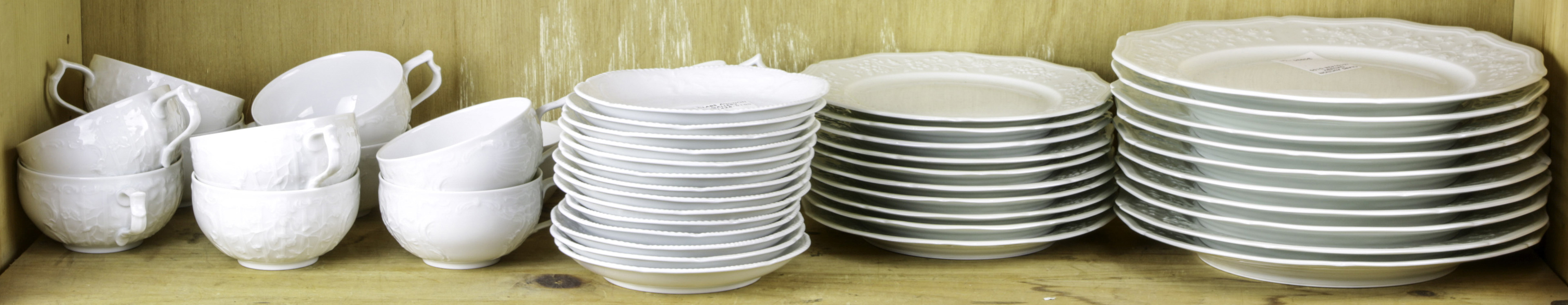 TWO SHELVES OF LIMOGES AND