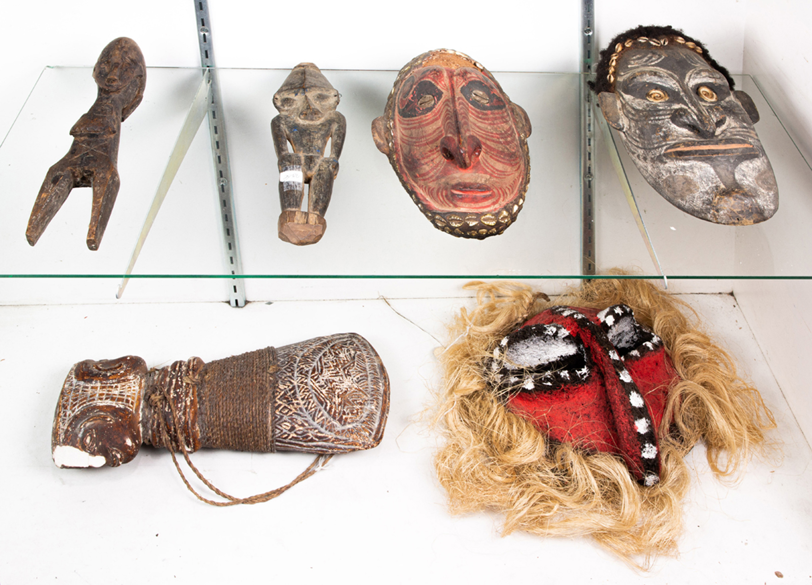 TWO SHELVES OF OCEANIC AND TRIBAL