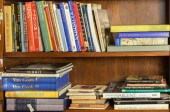 TWO SHELVES OF PHOTOGRAPHY ,AS