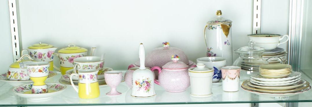 TWO SHELVES OF PORCELAIN AND