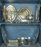 TWO SHELVES OF SILVERPLATE: A