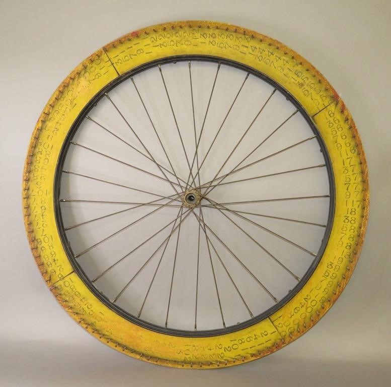 TWO-SIDED WIRE SPOKE CARNIVAL