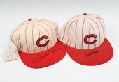 TWO SIGNED CINCINATTI REDS HAT