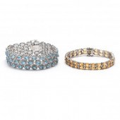 TWO SILVER AND GEM-SET BRACELE