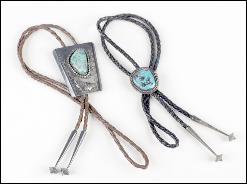 TWO SILVER AND TURQUOISE BOLOS.
