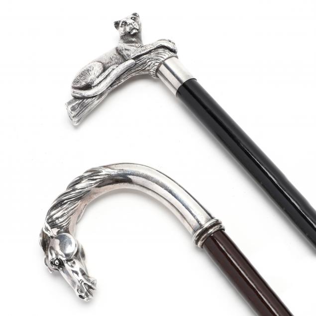 TWO SILVER FIGURAL HANDLED CANES
