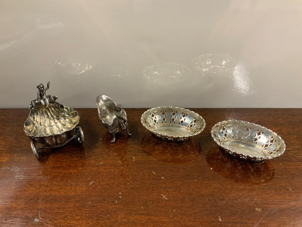 TWO SILVER FIGURAL OPEN SALTS AND A