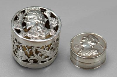 Two silver gaming boxes with