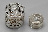 Two silver gaming boxes with c