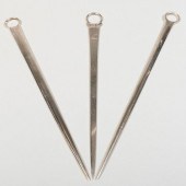 TWO SILVER MEAT SKEWERSCompris