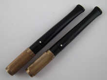 Two silver mounted cigarette