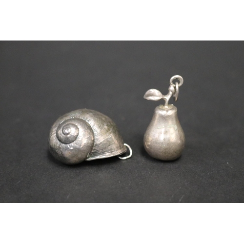 Two silver pendants shell and