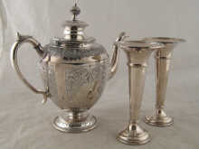Two silver plate spill vases