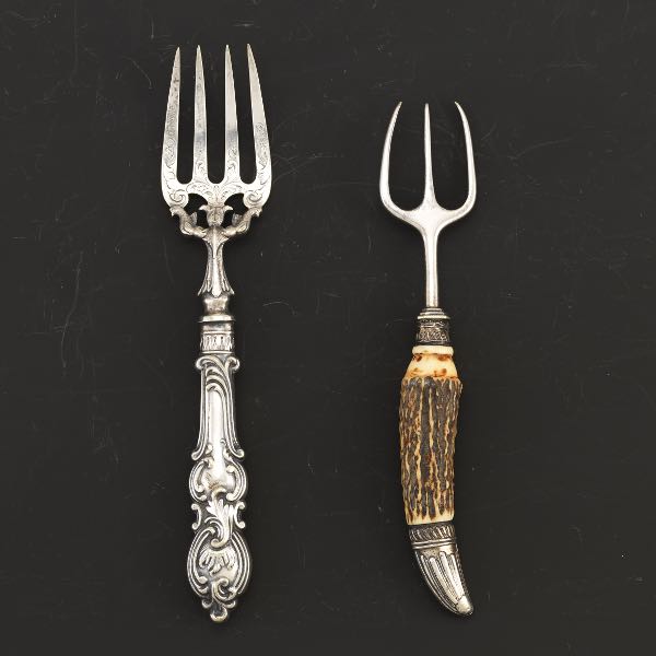 TWO SILVER SERVING FORKS  A