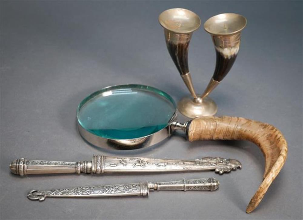 TWO SILVERED METAL DAGGERS, A TWO