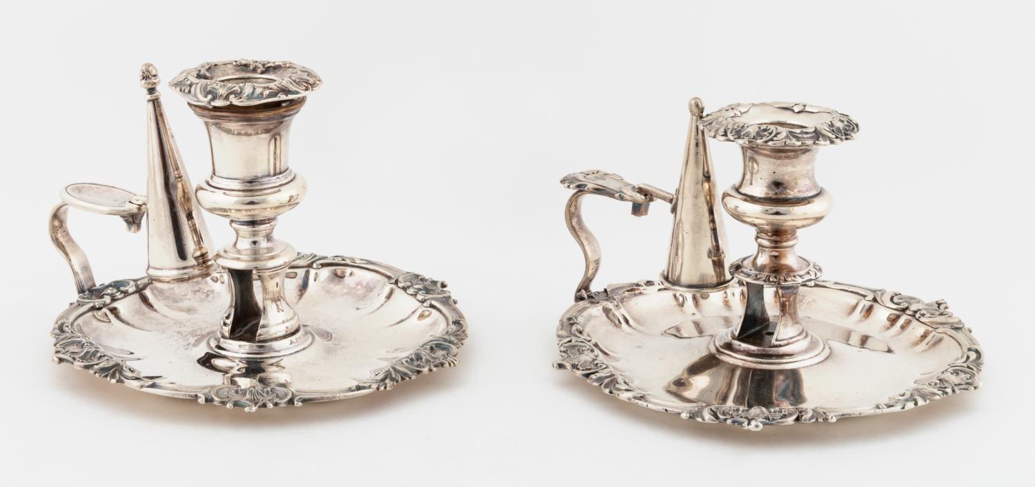 TWO SILVERPLATE CHAMBERSTICKS,