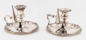 TWO SILVERPLATE CHAMBERSTICKS,