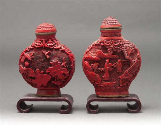 Two similar Chinese carved cinnabar