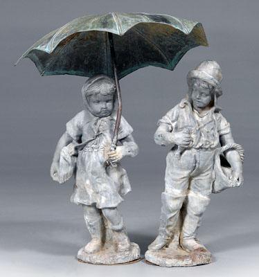 Two similar lead garden figures: