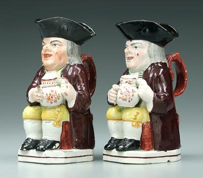 Two similar pearlware Toby jugs:
