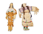 TWO SIOUX BEADED HIDE DOLLS<br